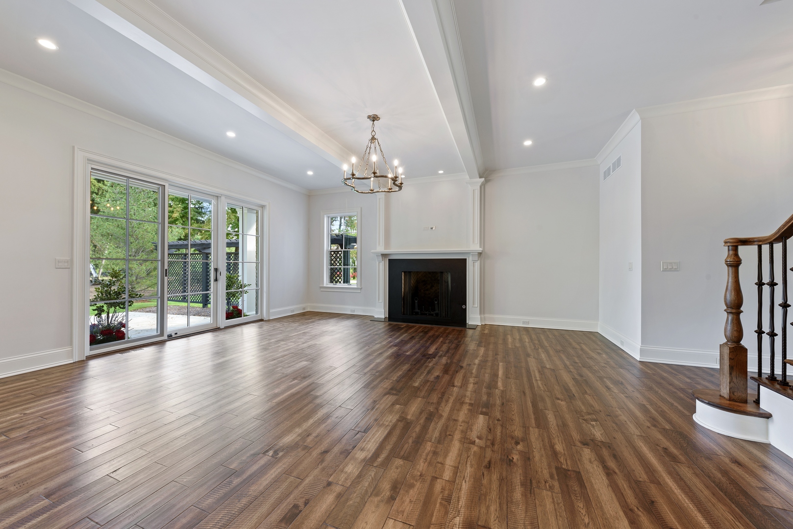 820 Country Club Road Crystal Lake, IL 60014 - Photo 16 of 48 a view of empty room with wooden floor and fireplace