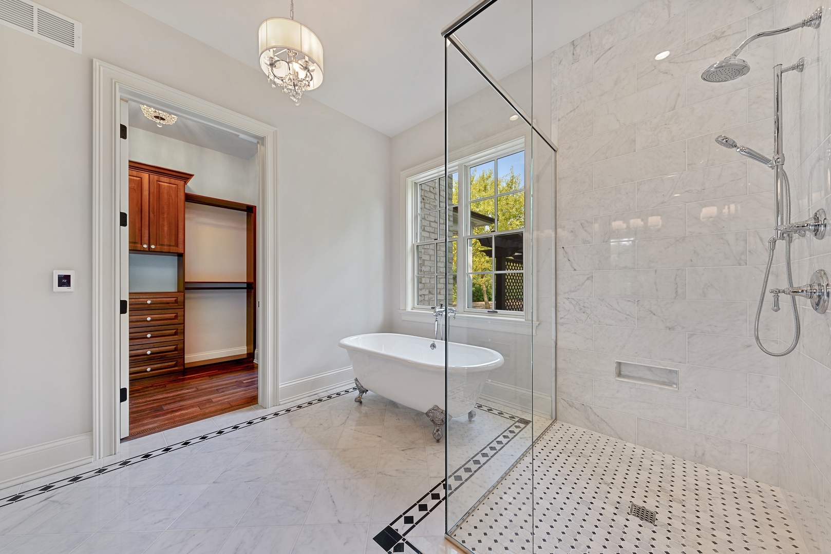 820 Country Club Road Crystal Lake, IL 60014 - Photo 25 of 48 a bathroom with a sink a toilet and shower