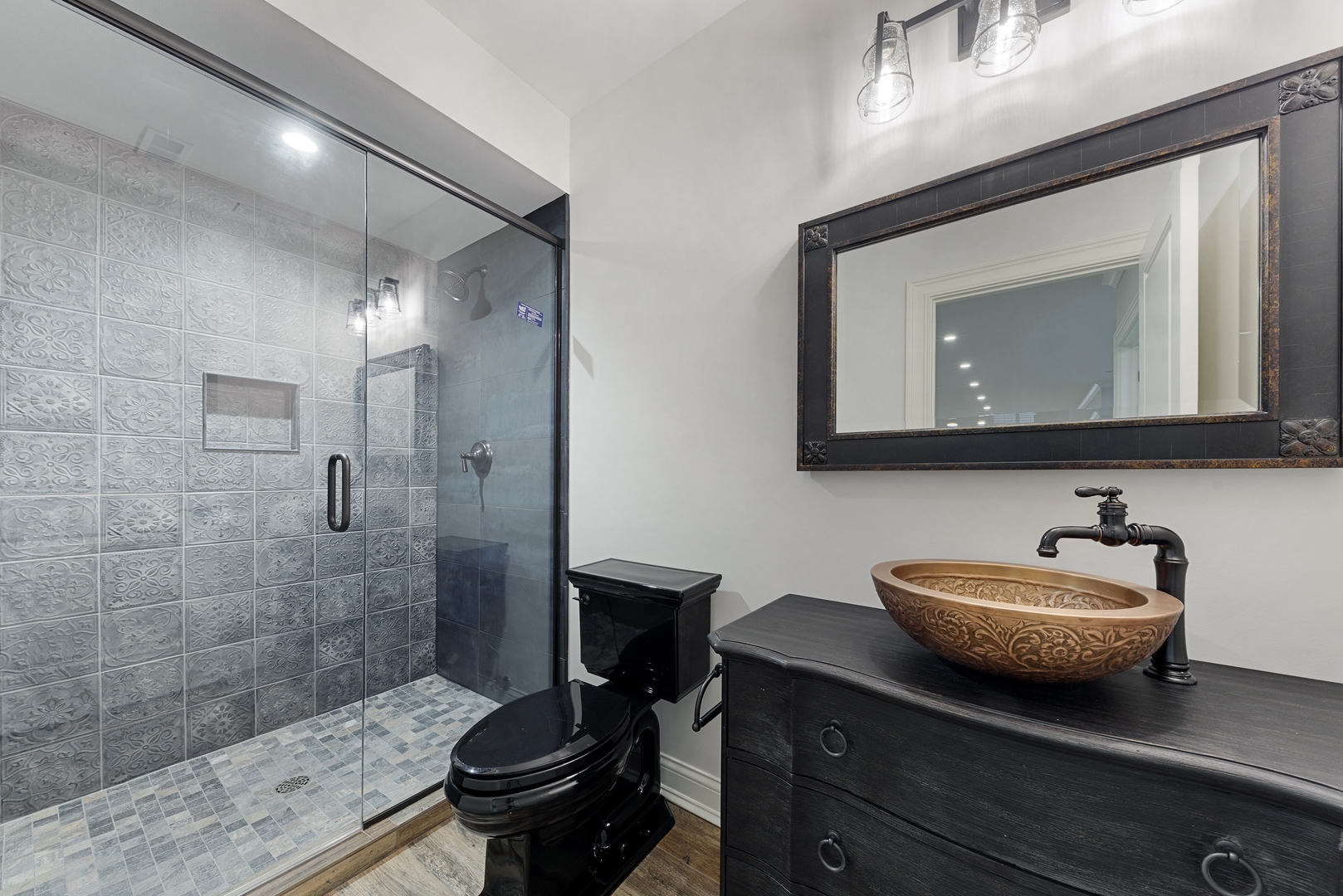 820 Country Club Road Crystal Lake, IL 60014 - Photo 37 of 48 a bathroom with a toilet a sink and mirror