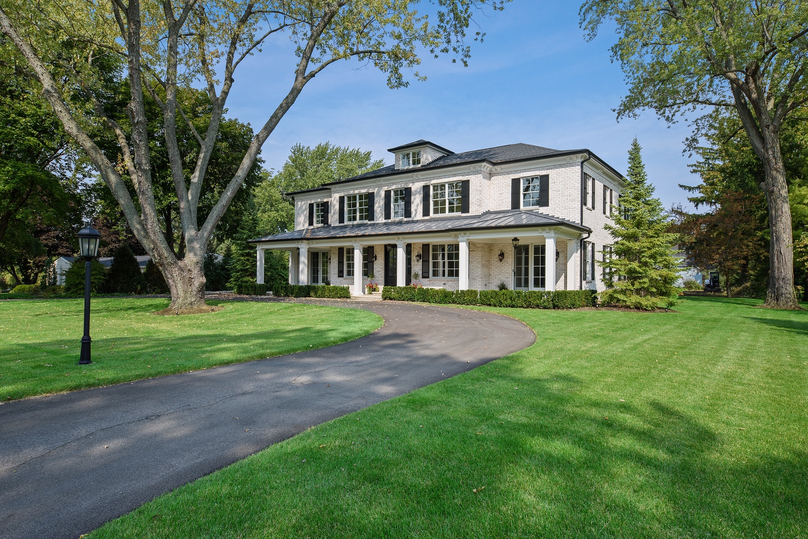 820 Country Club Road Crystal Lake, IL 60014 - Photo 38 of 48 a front view of a house with a yard