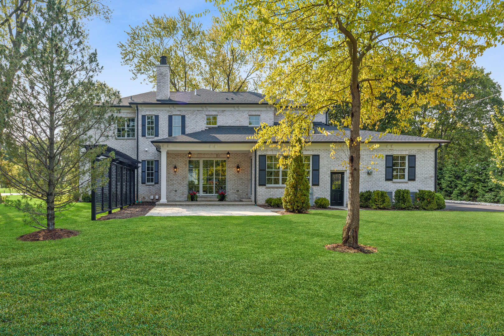 820 Country Club Road Crystal Lake, IL 60014 - Photo 43 of 48 a front view of a house with a garden