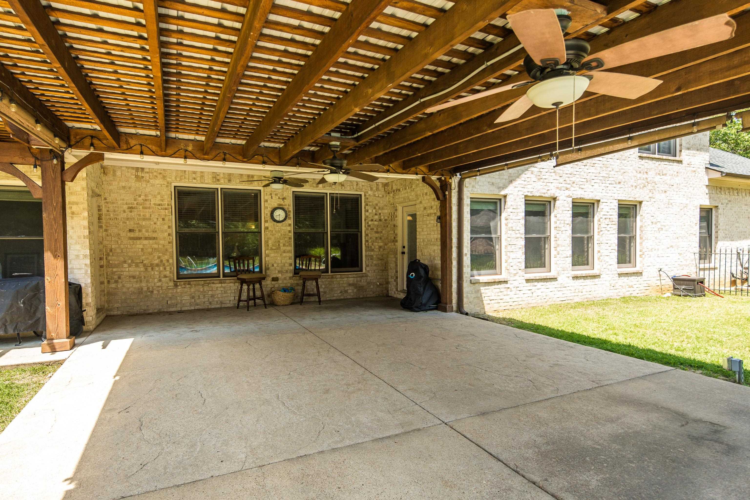 9028 Osborntown Road Arlington, TN 38002 - Photo 35 of 40 a view of a patio with table and chairs