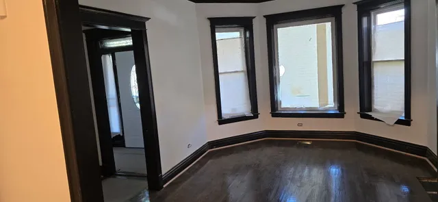 a view of a room that has a window in it
