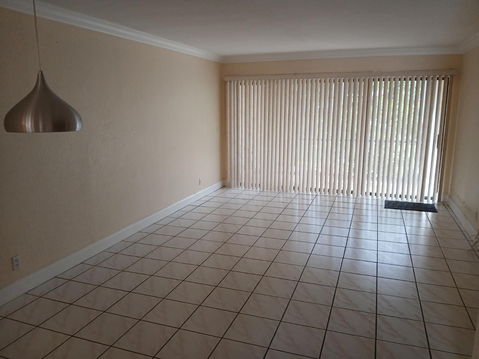 2339 Southwest 15th Street, Unit 19 Deerfield Beach, FL 33442 - Photo 6 of 15 a view of an empty room and wooden floor