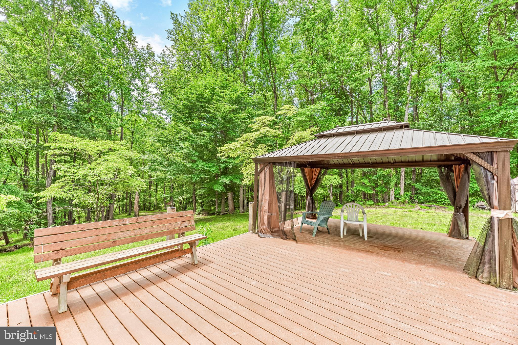 8310 Waverly Road Owings, MD 20736 - Photo 6 of 36 Gorgeous deck with garden boxes on the left side.