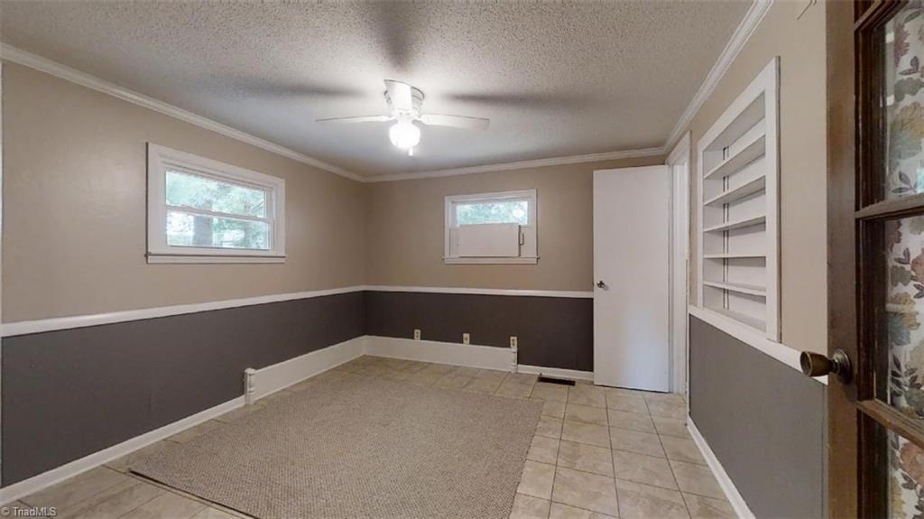 8392 West Harrell Road Oak Ridge, NC 27310 - Photo 22 of 23 Multi-purpose space with adjacent half bath. . . office, craft room, game room!!!