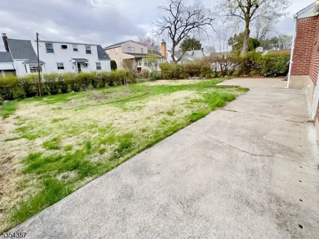 a view of a back yard of the house