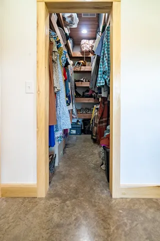 a kitchen with stainless steel appliances a refrigerator and a cabinets