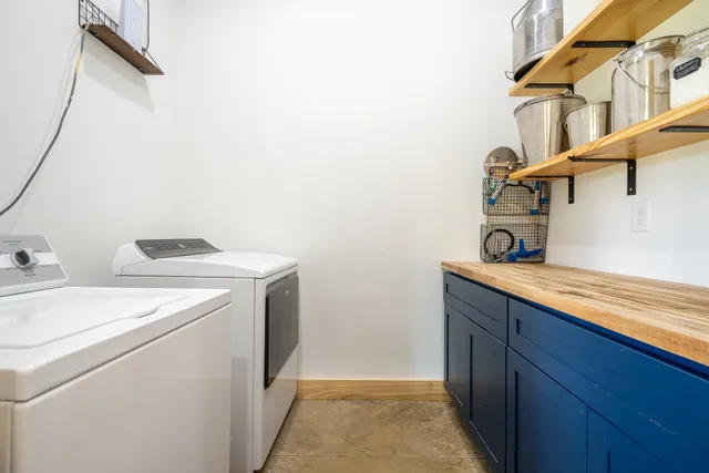 a bedroom with a bed and a walk in closet