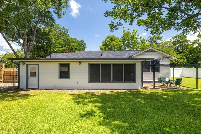 a house view with a garden space