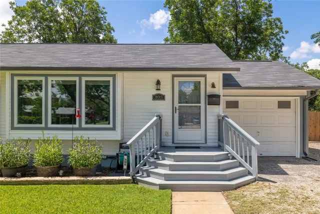 a view of house with outdoor space