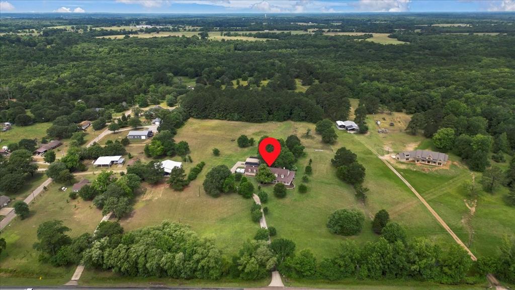 6299 Highway 271 Gilmer, TX 75644 - Photo 35 of 39 a view of a lake with a mountain