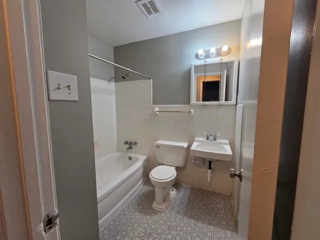 a view of backyard with green space