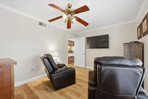 a view of a balcony with furniture