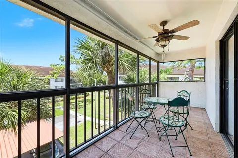 a view of a yard with an outdoor seating