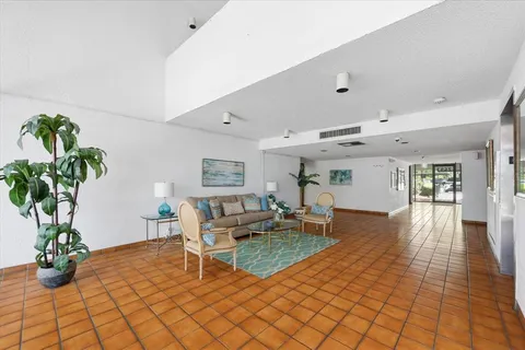 a view of front door with wooden floor