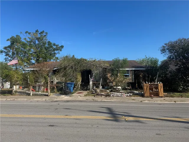 a view of a building with a street