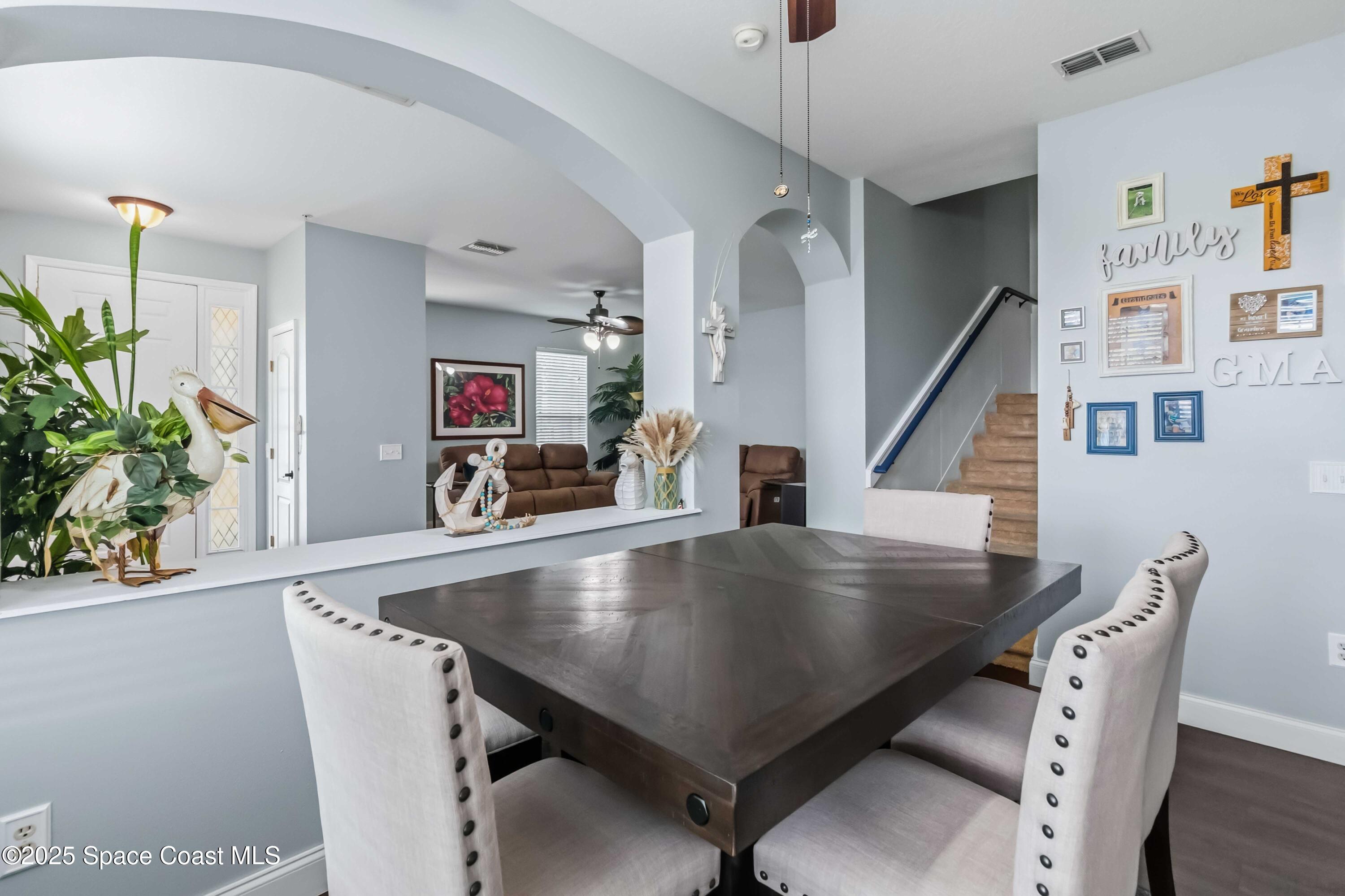 3607 Clay Brick Road Harmony, FL 34773 - Photo 14 of 72 a view of kitchen island with furniture and wooden floor