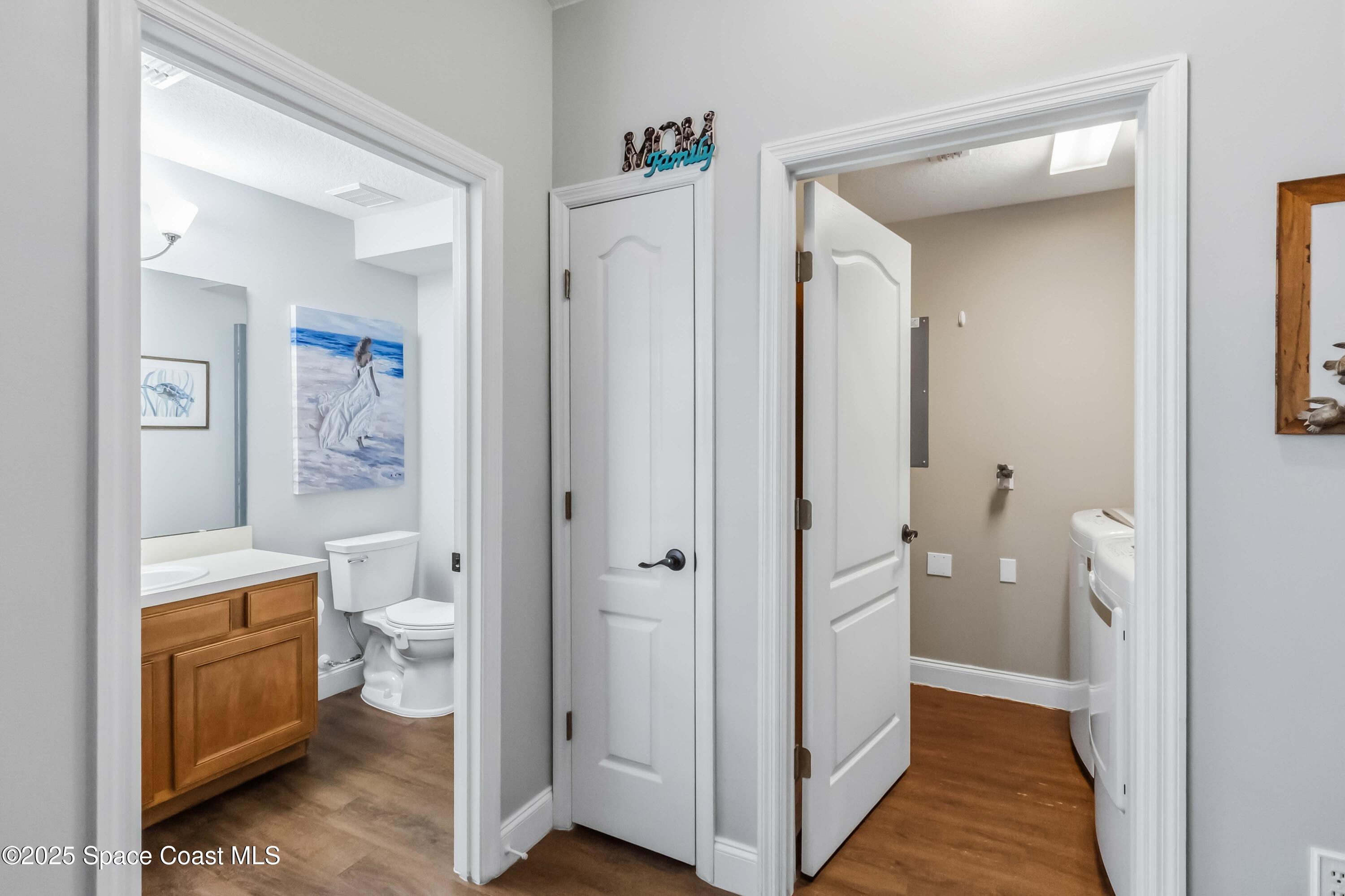 3607 Clay Brick Road Harmony, FL 34773 - Photo 22 of 72 a bathroom with a granite countertop toilet and a shower