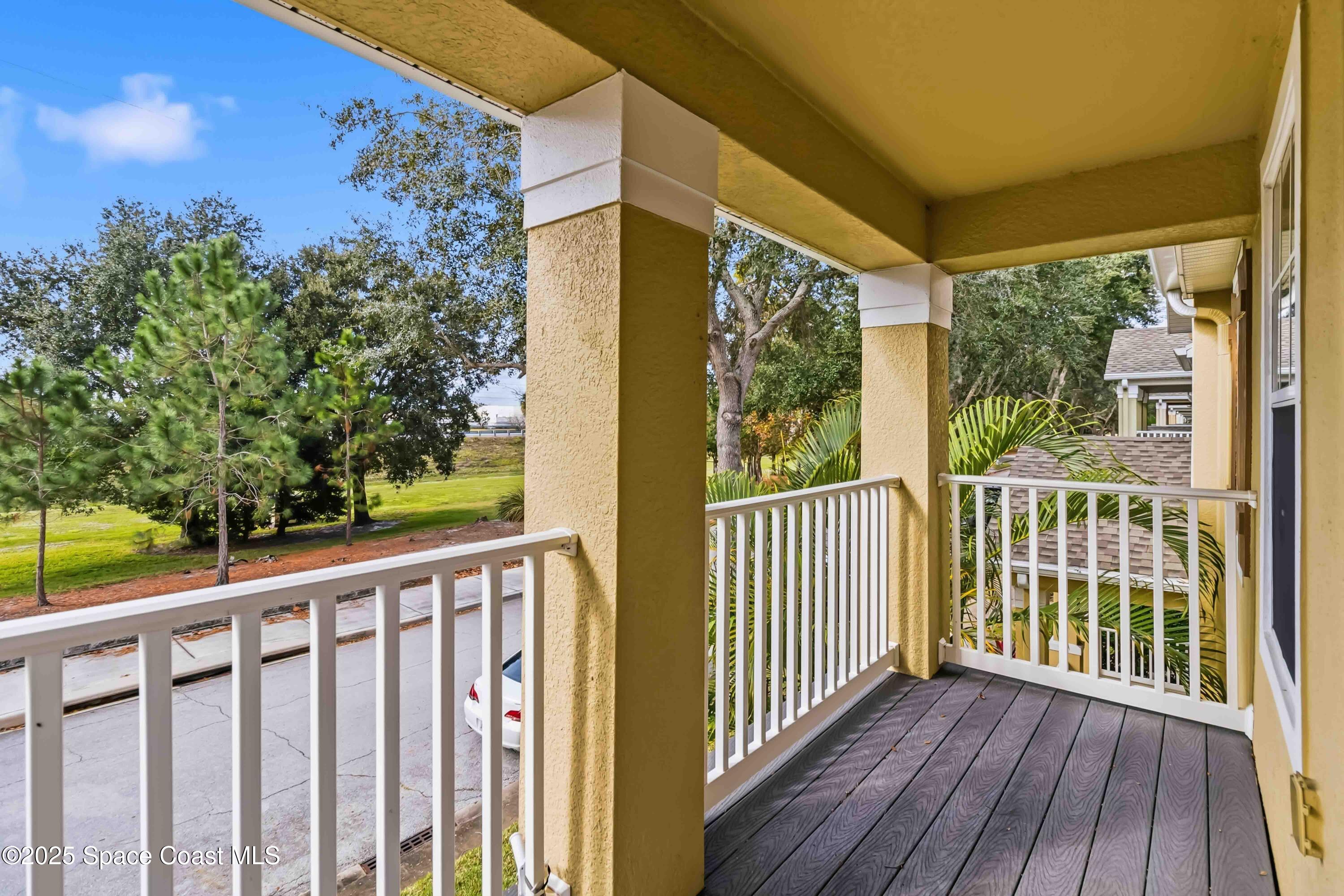 3607 Clay Brick Road Harmony, FL 34773 - Photo 43 of 72 a view of a porch with wooden floor and outdoor space