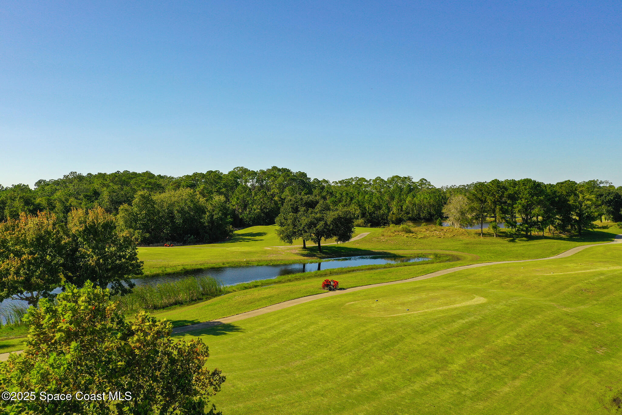 3607 Clay Brick Road Harmony, FL 34773 - Photo 70 of 72 a view of a swimming pool and lake view