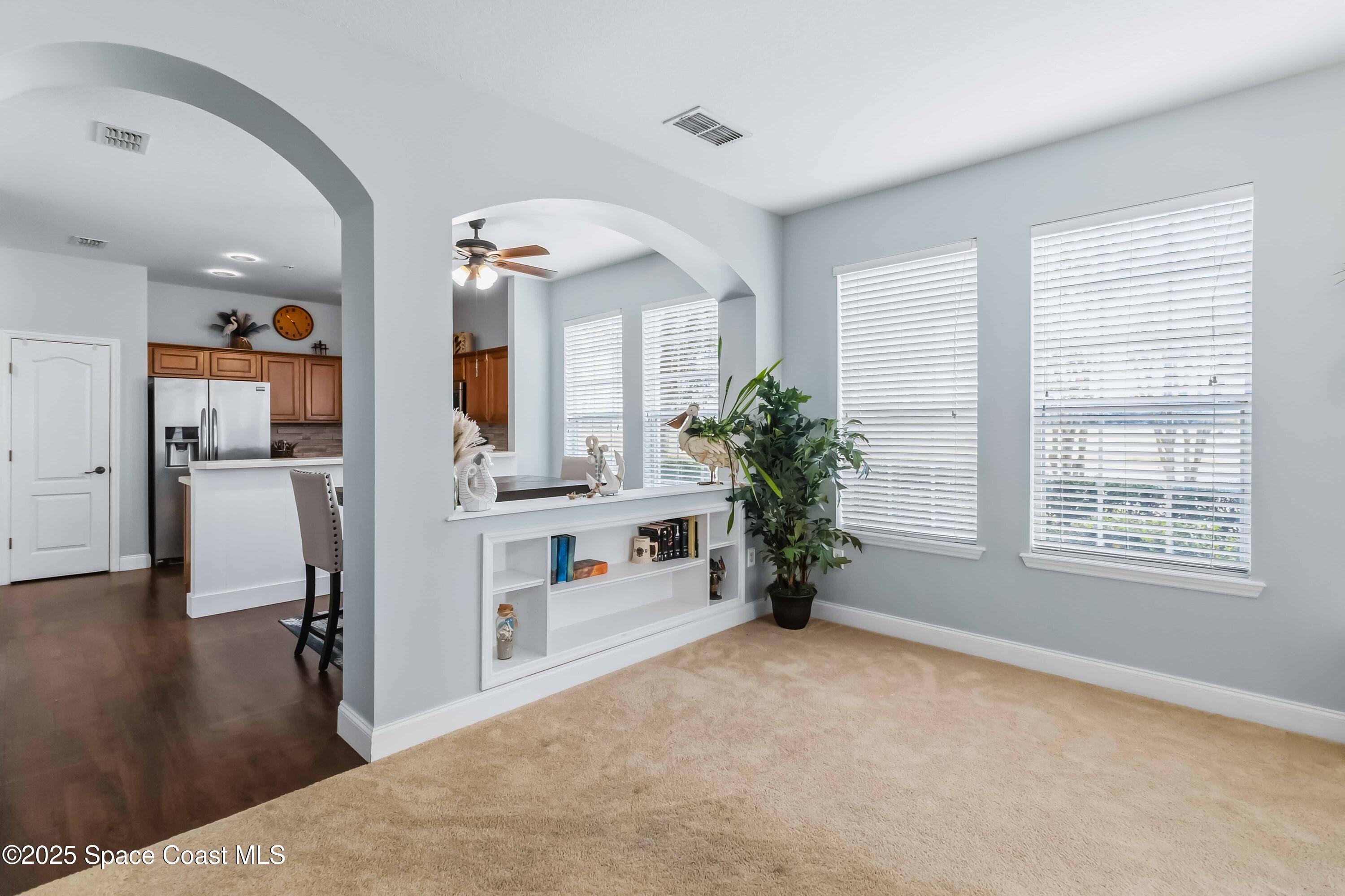 3607 Clay Brick Road Harmony, FL 34773 - Photo 7 of 72 a view of livingroom with furniture and window