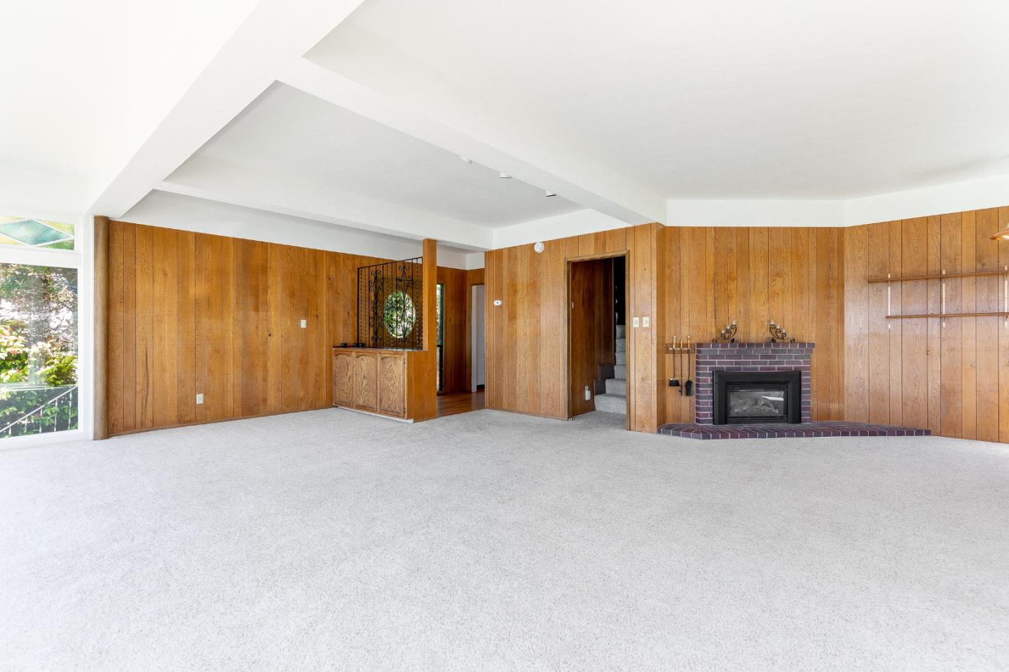 106 Cliff Avenue Capitola, CA 95010 - Photo 18 of 30 a view of an empty room with a fireplace