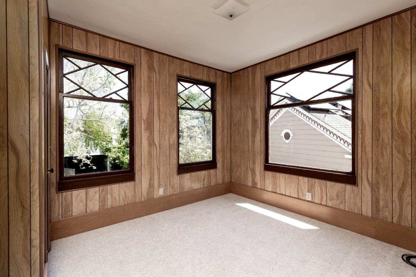 106 Cliff Avenue Capitola, CA 95010 - Photo 24 of 30 an empty room with large windows