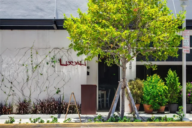 a city street lined with tall buildings