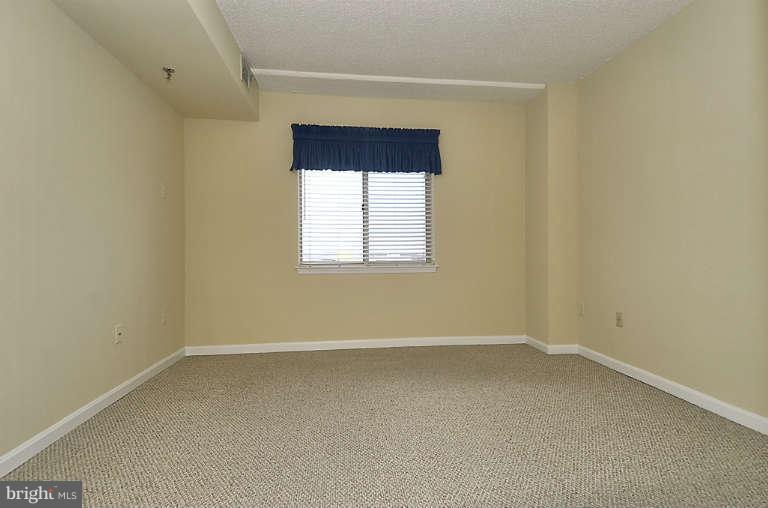 24 Courthouse Square, Unit 907 Rockville, MD 20850 - Photo 12 of 30 an empty room with a window