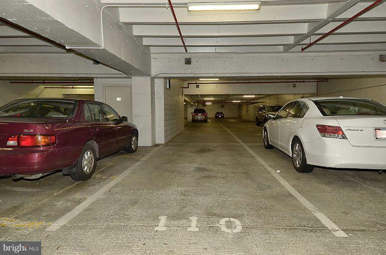 24 Courthouse Square, Unit 907 Rockville, MD 20850 - Photo 16 of 30 a car parked in garage