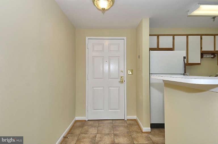 24 Courthouse Square, Unit 907 Rockville, MD 20850 - Photo 3 of 30 a view of bathroom with a sink mirror and window
