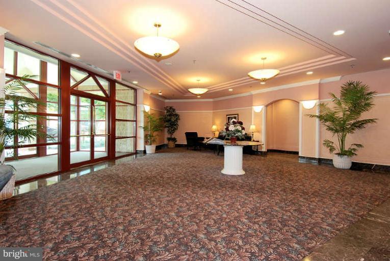24 Courthouse Square, Unit 907 Rockville, MD 20850 - Photo 21 of 30 a view of a room with gym equipment