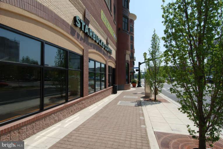 24 Courthouse Square, Unit 907 Rockville, MD 20850 - Photo 26 of 30 a view of a building with sitting area