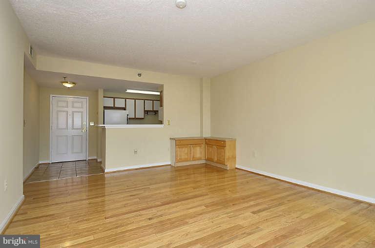 24 Courthouse Square, Unit 907 Rockville, MD 20850 - Photo 9 of 30 a view of empty room with wooden floor
