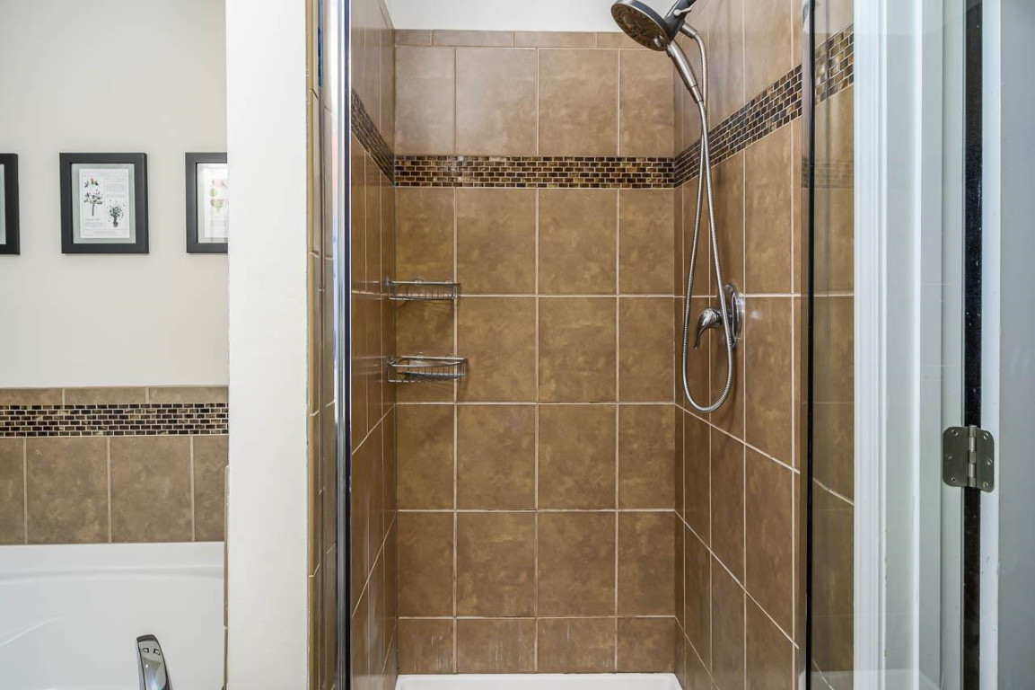 68 Argonaut Drive Durham, NC 27705 - Photo 22 of 29 a bathroom with a shower