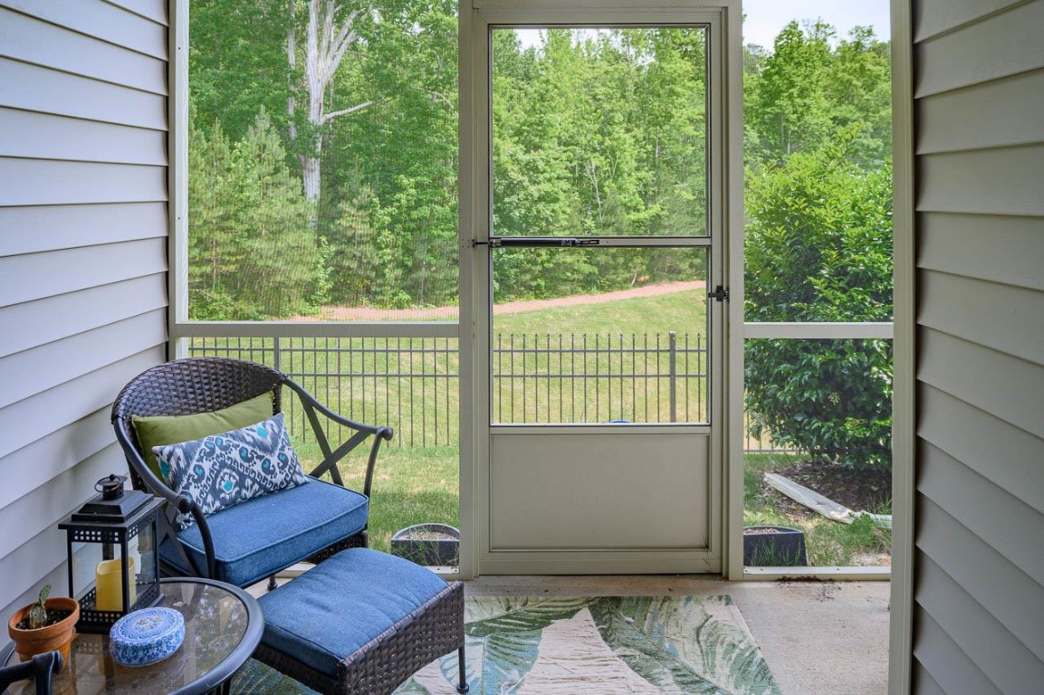 68 Argonaut Drive Durham, NC 27705 - Photo 27 of 29 a outdoor living space with furniture and a potted plant