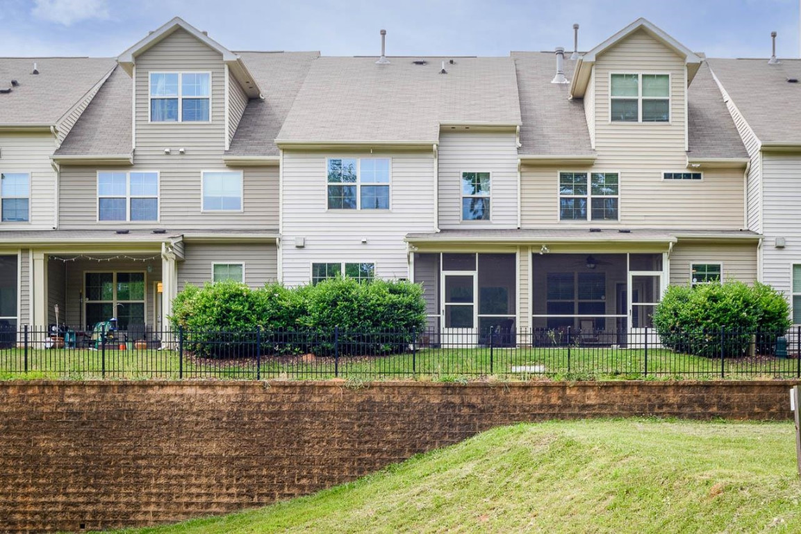68 Argonaut Drive Durham, NC 27705 - Photo 29 of 29 front view of a brick house with a yard
