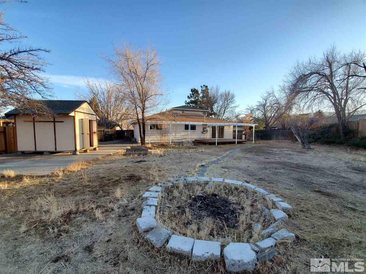 725 James Court Reno, NV 89503 - Photo 23 of 29 a front view of a house with a yard