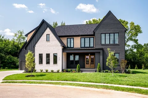 front view of a house and a yard