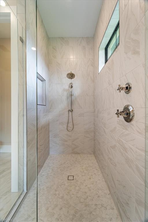 699 1st Street Northwest Naples, FL 34120 - Photo 21 of 42 a bathroom with a shower