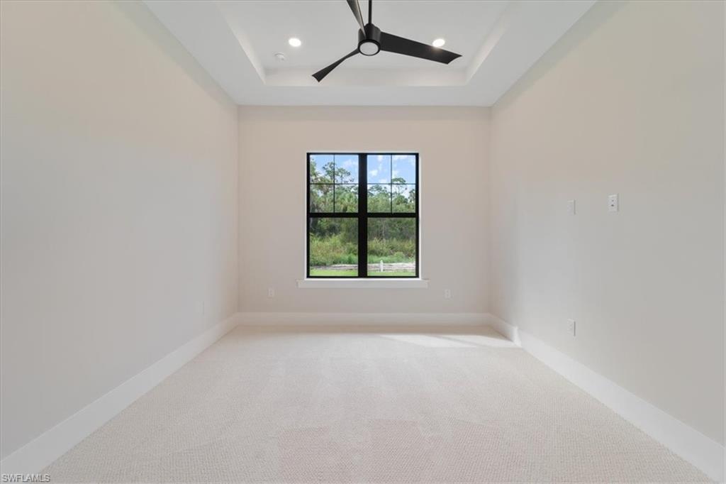 699 1st Street Northwest Naples, FL 34120 - Photo 30 of 42 an empty room with a window