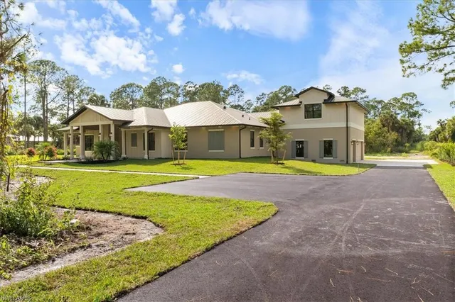 a view of outdoor space yard and front view of a house