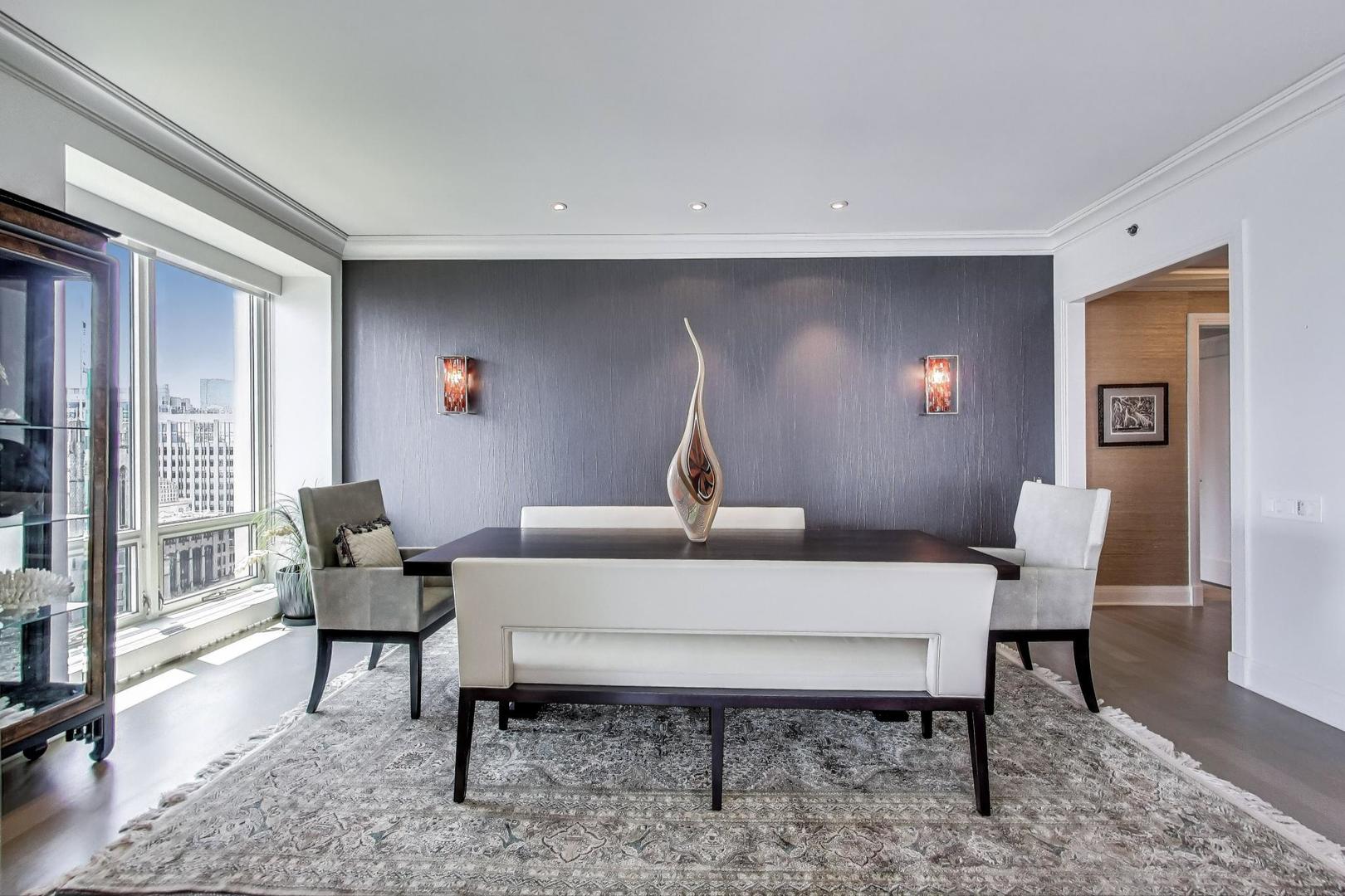 840 North Lake Shore Drive, Unit 2401 Chicago, IL 60611 - Photo 14 of 40 a living room with furniture and a window