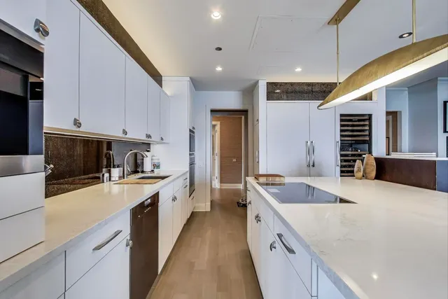 a view of a dining room with furniture and window