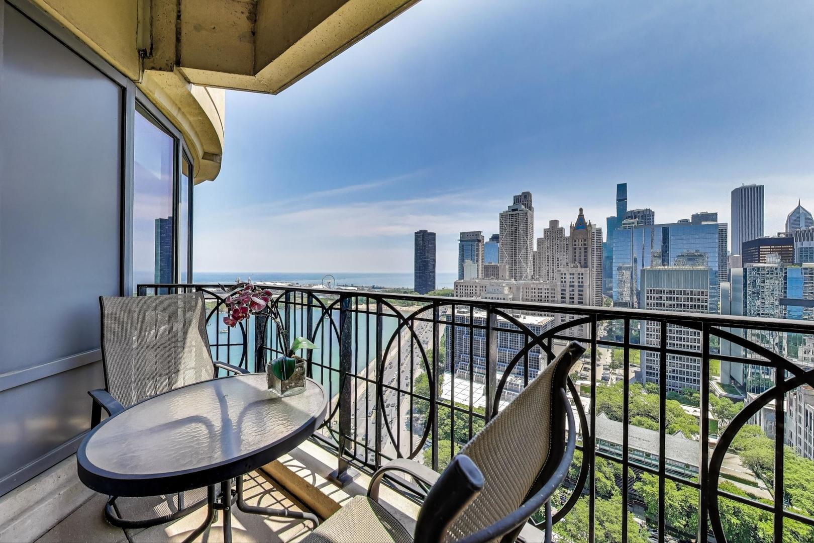 840 North Lake Shore Drive, Unit 2401 Chicago, IL 60611 - Photo 24 of 40 a view of a balcony with furniture