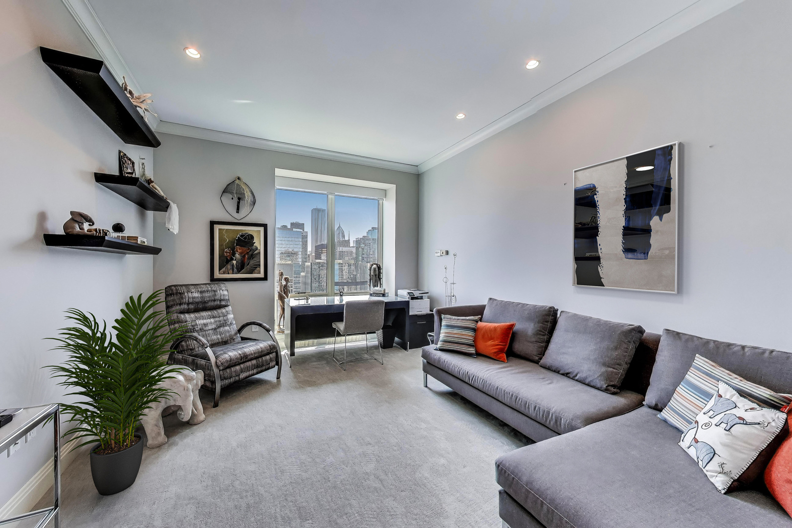 840 North Lake Shore Drive, Unit 2401 Chicago, IL 60611 - Photo 33 of 40 a living room with furniture kitchen view and a potted plant