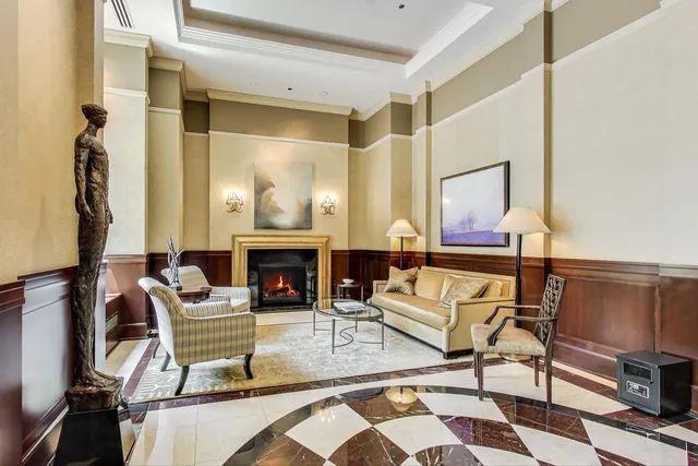 a kitchen with granite countertop a stove and cabinets
