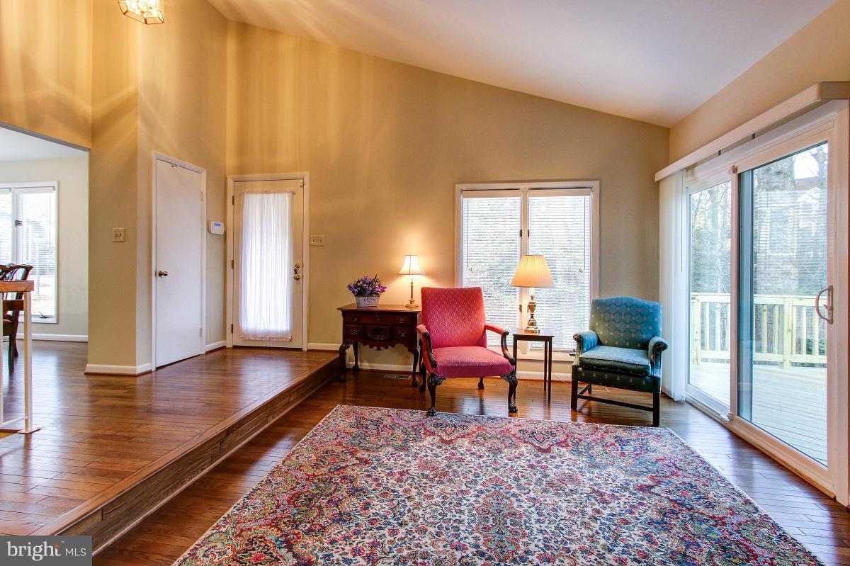 11614 Chapel Cross Way Reston, VA 20194 - Photo 5 of 30 a living room with furniture and a wooden floor