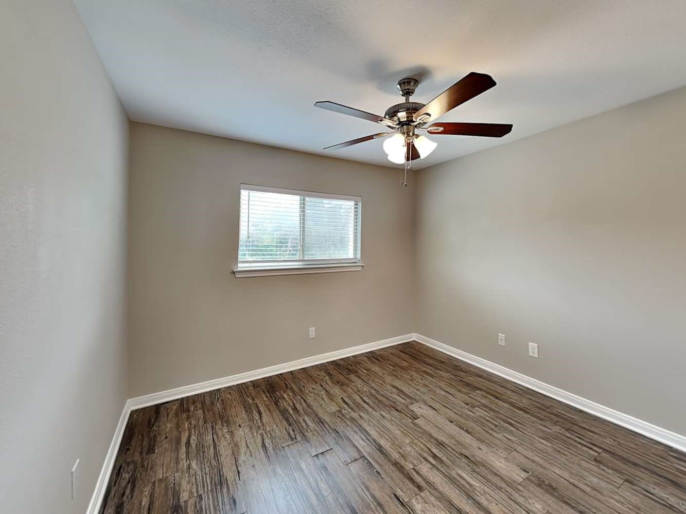 179 Holly Street, Unit 503 Georgetown, TX 78626 - Photo 12 of 18 a view of empty room with wooden floor